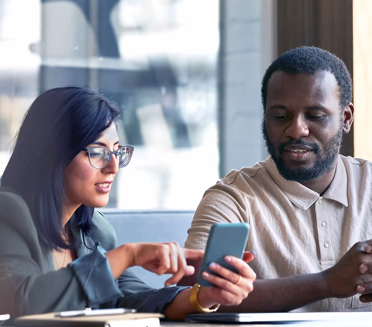 two-business-people-meeting-in-cafe-2021 two-business-people-meeting-in-cafe-2021